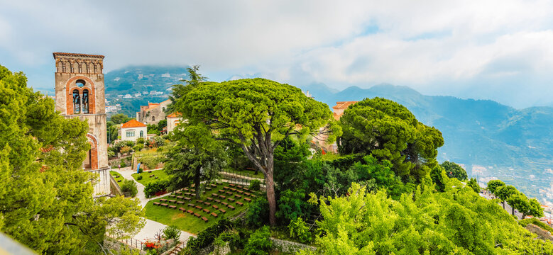 Coastline in southern Italy, vertiginous cliffs adorned with colorful villages, turquoise waters. Villa Rufolo in Ravello on Amalfi Coast in Italy.