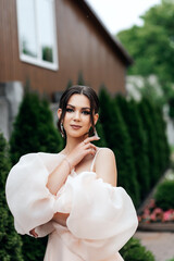 woman in a light pastel dress