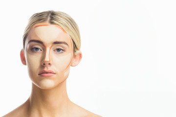 Beauty model woman posing with contour makeup and bare shoulders at professional studio, copy space