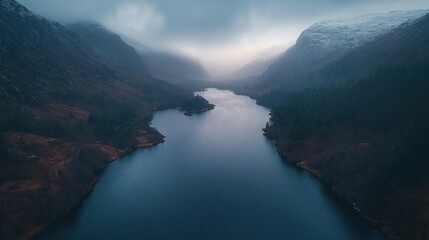 Misty mountain lake, aerial view
