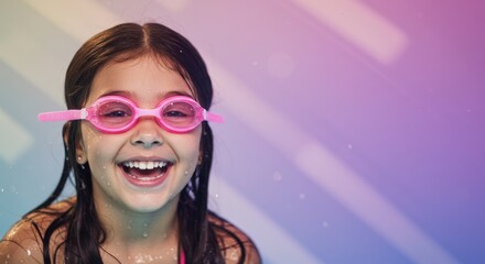 Child swimming with goggles and smiling underwater