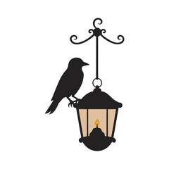 Black Bird Sitting On Old Lantern
