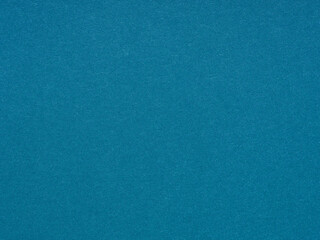 A tranquil teal texture whispers of serene seascapes and the gentle caress of ocean waves