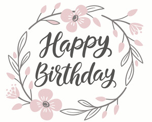 Obraz premium Elegant handwritten calligraphy happy birthday text surrounded by a delicate floral wreath with soft pink flowers and grey leaves