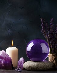 Mystical still life composition with a glowing purple crystal ball on a stone, surrounded by amethyst crystals, a lit white candle, and dried lavender flowers. Dark moody background.