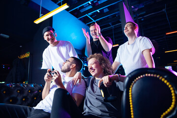 Modern relax, Young diverse friends enjoy competitive esports gaming session