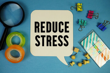 Reduce Stress text with magnifying glass on blue background