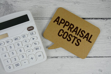 Appraisal Costs text with calculator on wooden background