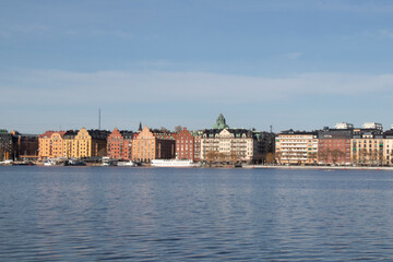 Colorful waterfront buildings in Stockholm on a clear spring day.
Scenic view of Stockholm skyline...