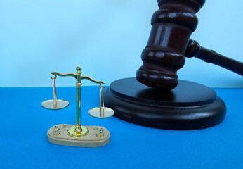 Gavel and balance scales symbolizing justice in a legal context concept