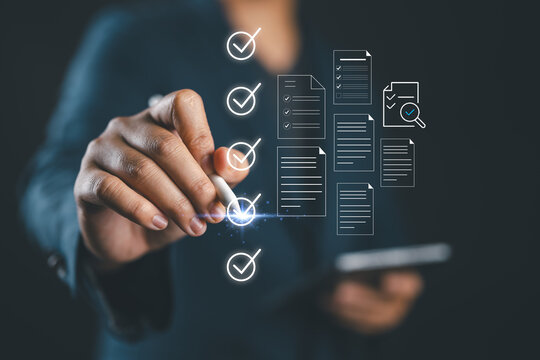 Checklist business performance monitoring concept, Businessman using tablet online survey filling out check digital form task, survey question form, target marketing planning with quality control
