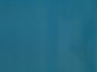 Steel blue surface of an old paper or cardboard, background, texture. Backdrop of blue paper...