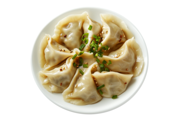 Steamed mandu dumplings placed in circular pattern on ceramic plate, isolated on white transparent background, concept of Asian cuisine