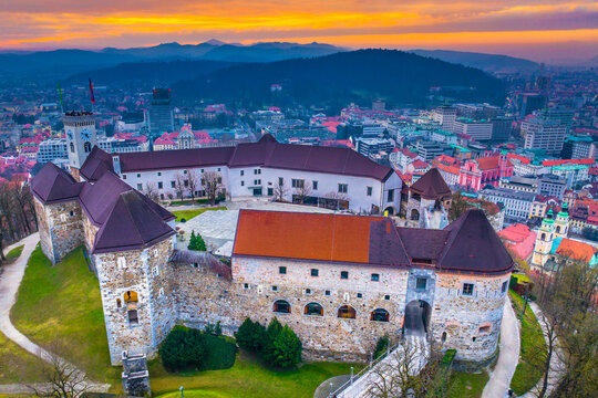 Aerial view of Ljubljana, the capital of Slovenia, showcasing the charming old town with its red rooftops, historic streets, and the iconic sightseeing spot perched on a hill above the city center
