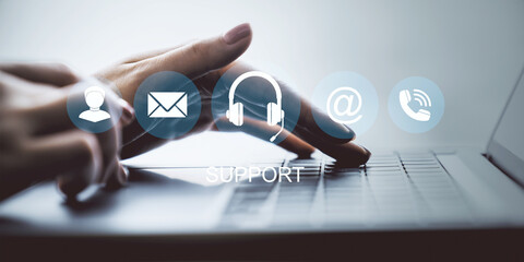 Closeup of woman's hands typing on laptop keyboard with support service communication icons overlayed on a light blurred background interface.