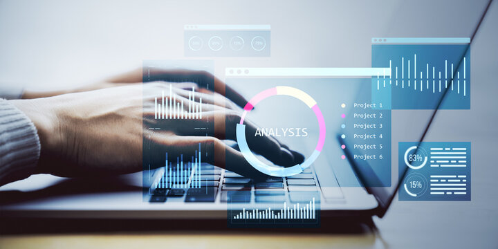 Businessperson typing on laptop with digital analytics dashboard and data visualizations overlayed on screen in a modern technology concept scene.