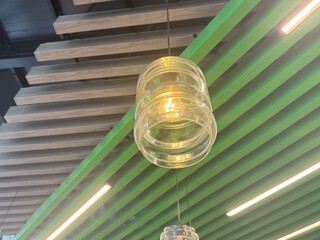 The lighting is modern in a stylish cafe. High quality photo