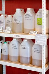 Various eco-friendly cleaning products and supplies displayed on shelves at Eco shop