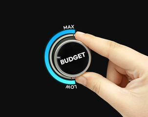 Average budget spending showing on the glowing knob with turning direction, business, expenses
