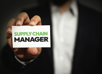 Supply Chain Manager hiring concept with typography written on the card shown by a man, human resources
