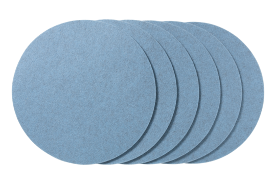 Stack of light blue circular felt coasters isolated on transparent background