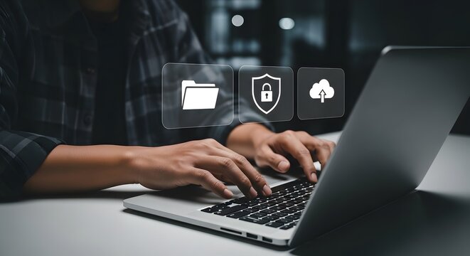Man manages data on laptop, showcasing secure cloud storage, ensuring file management, protection and easy data upload for optimal productivity.