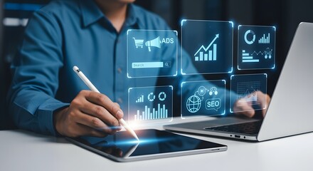 Businessman working on digital marketing strategy using tablet and laptop for business growth and success online with futuristic technology.