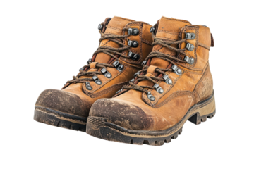 Worn Leather Work Boots Pair Protective Footwear Construction Safety Gear Muddy Job on transparent background