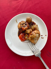 Delicious Steamed Siomay with Peanut Sauce and Fork Culinary Still Life