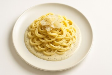 Creamy Pasta Dish with Parmesan Cheese on a White Plate