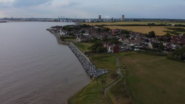 Drone. River Hull. Coastal village, housing flood defences. 