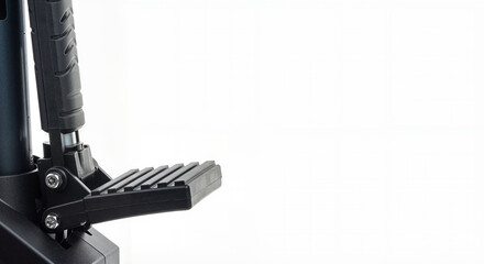 Close-up of a tire pump foot pedal in sleek design on bright background