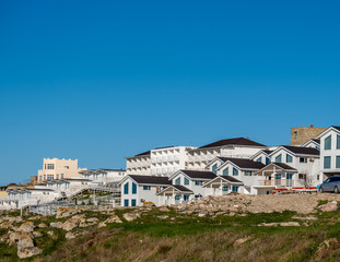 Obraz premium New stone villas on a hill.