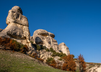 View of the rocky mountains against the blue sky.