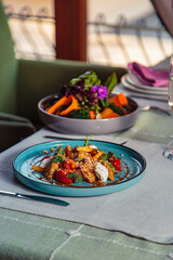 different salads with meat and seafood