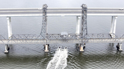 A stunning Aerial View of Pacific Highway Harwood Bridge crosses the Clarence River under a cloudy sky in the Northern Rivers region of New South Wales, Australia 