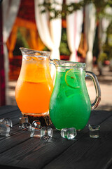 different drinks with ice and mint