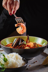 different soup with meat and seafood