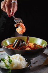 different soup with meat and seafood