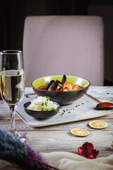 different soup with meat and seafood