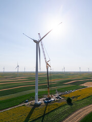 Wind turbine installation using a large construction crane. The assembly process of the turbine...