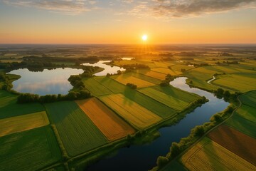 Bird's-eye perspective of rural farmland and water bodies
