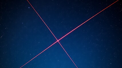 Double-exposure night sky with intersecting vibrant meteor trails, representing celestial events.