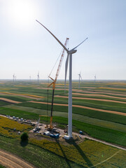 Wind turbine installation using a large construction crane. The assembly process of the turbine...