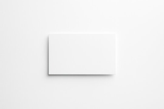 Minimalist white background with a blank business card for design mockup - Powered by Adobe