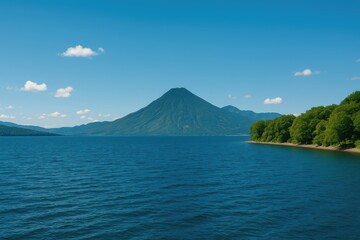 Obraz premium Vast aquatic expanse with a mountain range behind it