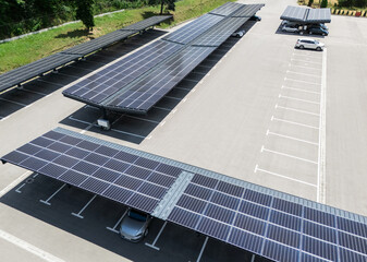 Aerial view of parking space with solar canopies