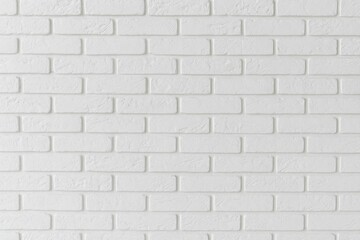 Naklejka premium Background featuring a white brick wall