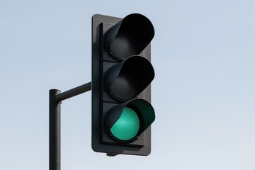 A green traffic signal indicating go