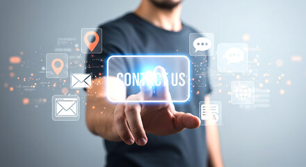 Man touching a digital contact us button surrounded by icons on a light gray background in a studio